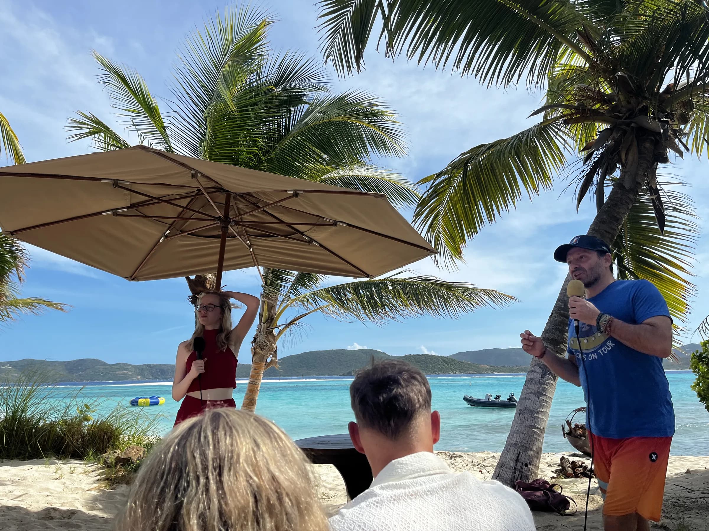 Yanik Silver speaking to the NEXT cohort under the palms on Necker Island